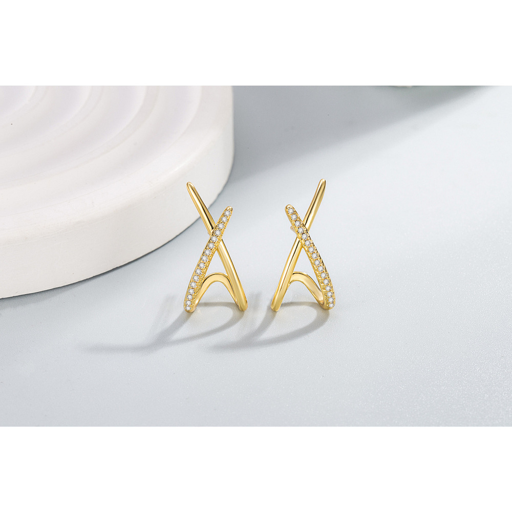 Double U earrings with hollowed-out inner arches.